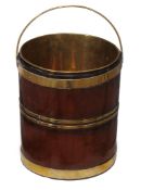 A George III brass bound mahogany bucket , circa 1770  A George III brass bound mahogany bucket  ,