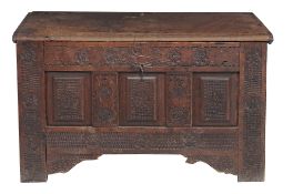 A carved oak coffer , circa 1750 and later  A carved oak coffer  , circa 1750 and later, the lift