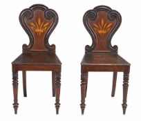 A pair of early Victorian oak hall chairs, circa 1840  A pair of early Victorian oak hall