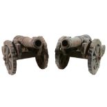 A pair of Victorian cast iron models of garrison cannon, late 19th century  A pair of Victorian cast