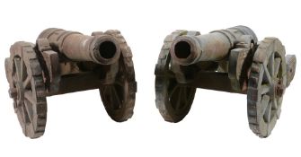 A pair of Victorian cast iron models of garrison cannon, late 19th century  A pair of Victorian cast