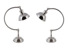 A pair of nickel plated metal adjustable desk lamps, of recent manufacture  A pair of nickel