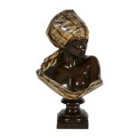 A Continental cold painted electrotype copper bust of a Nubian maiden  A Continental cold painted