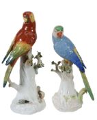 Two similar German porcelain models of parrots, 20th century, 26cm and 29cm high  Two similar German