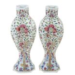 An attractive pair of Chinese Famille Rose vases  An attractive pair of Chinese Famille Rose vases,