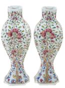 An attractive pair of Chinese Famille Rose vases  An attractive pair of Chinese Famille Rose vases,