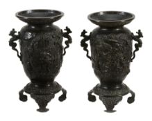 A Pair of Japanese Bronze Vases, each of tapered cylindrical form resting on...  A Pair of