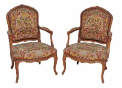 A pair of needlework upholstered armchairs in Louis XVI style  A pair of needlework upholstered