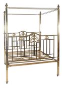 A brass four poster bed in Victorian style , 20th century  A brass four poster bed in Victorian