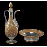 A Bohemian clear-glass and gilt pear-shaped slender ewer  A Bohemian clear-glass and gilt pear-