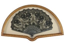 A large mother-of-pearl mounted lace fan, 19th century  A large mother-of-pearl mounted lace