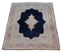 A Kirman carpet , approximately 373cm x 273cm  A Kirman carpet  , approximately 373cm x 273cm