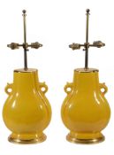 A pair of Chinese yellow monochrome vases  A pair of Chinese yellow monochrome vases,   of lobed