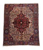A Bakhtiar rug , approximately 208 x 168cm  A Bakhtiar rug  , approximately 208 x 168cm,   a Ghom