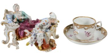 A Vienna porcelain coffee cup and saucer , mid 18th century  A Vienna porcelain coffee cup and
