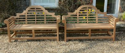 A pair of teak garden seats in the manner of Lutyens, of recent manufacture  A pair of teak garden