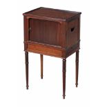 A mahogany bedside cupboard, first quarter 19th century  A mahogany bedside cupboard,   first