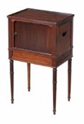 A mahogany bedside cupboard, first quarter 19th century  A mahogany bedside cupboard,   first