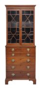 A George III mahogany cabinet on chest , circa 1800 and later  A George III mahogany cabinet on