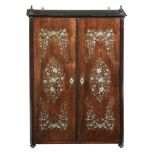 An Anglo-Indian rosewood and mother of pearl inlaid cupboard , mid 19th century  An Anglo-Indian