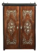 An Anglo-Indian rosewood and mother of pearl inlaid cupboard , mid 19th century  An Anglo-Indian