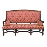 A Continental walnut upholstered sofa, last quarter 19th century  A Continental walnut upholstered