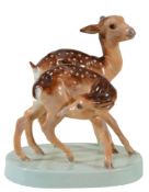 A Royal Worcester animal group; 'Young Spotted Deer'  A Royal Worcester animal group; 'Young Spotted