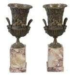 A pair of Continental bronze and marble mounted twin handled urns, circa 1875  A pair of Continental