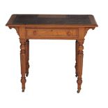 A Victorian oak writing table , circa 1870, in the manner of Gillows  A Victorian oak writing table