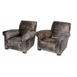 A p air of leather upholstered armchairs , circa 1930  A p air of leather upholstered armchairs  ,