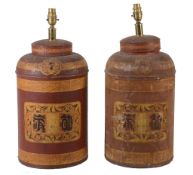 A pair of Regency red japanned and parcel gilt metal tea canisters  A pair of Regency red japanned