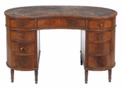 A Howard and Sons mahogany kidney desk, circa 1900  A Howard and Sons mahogany kidney desk,