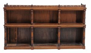 An early Victorian walnut open bookcase , circa 1850  An early Victorian walnut open bookcase  ,