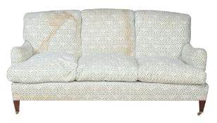 An upholstered sofa , first half 20th century, in the manner of Howard & Sons  An upholstered