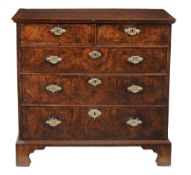 A George II walnut and crossbanded chest , circa 1740  A George II walnut and crossbanded chest  ,