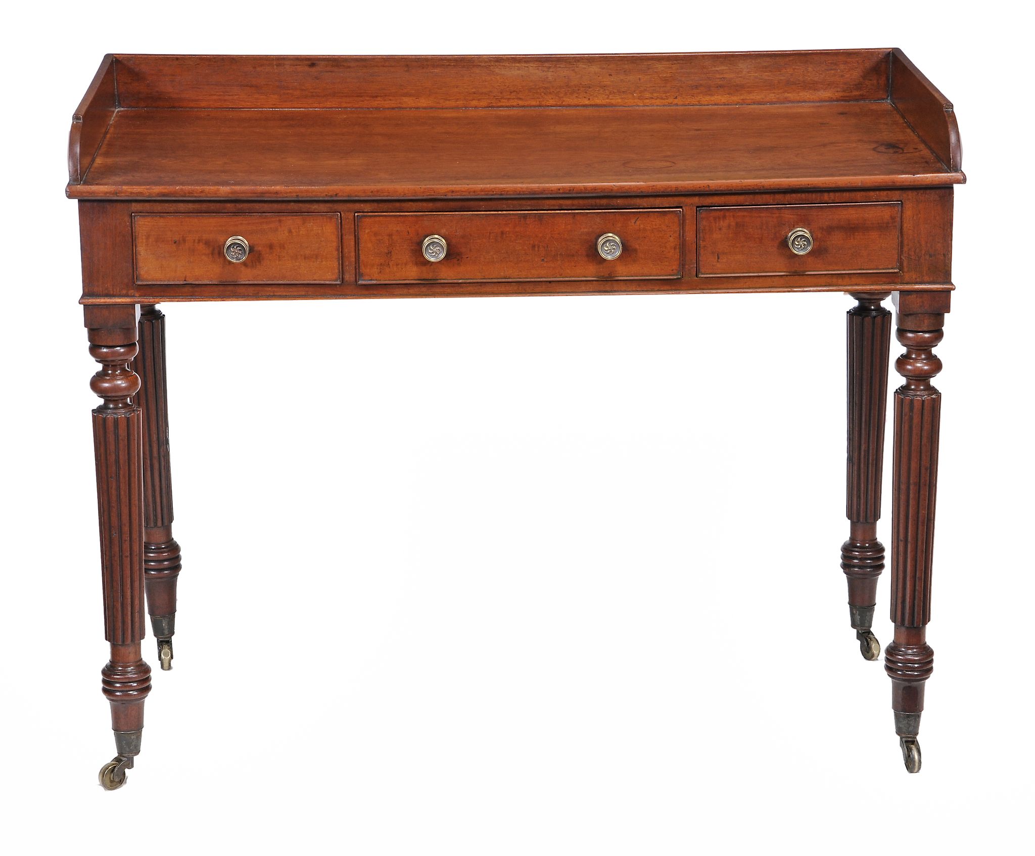 A William IV mahogany three drawer writing table, circa 1830  A William IV mahogany three drawer