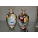 A pair of Royal Worcester Hadley's ware globular vases, painted with roses, puce printed marks, date