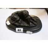 After Mene, a bronze model of a greyhound, lying down, on plinth base, 5.5cm high approx.
