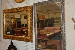 Four gilt mirrors together with a floral still life Best Bid