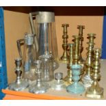 Two pairs of 19th Century brass candlesticks, three other single candlesticks, a large electroplated