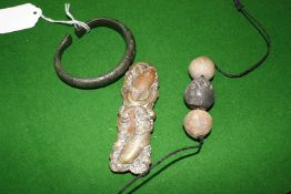 An Indian terracotta plaque, a torque bangle, a small alabaster vase, a beaded necklace etc