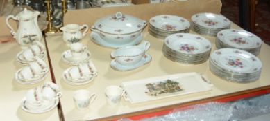 A modern French part dinner service, floral decorated and a French part tea service, with floral