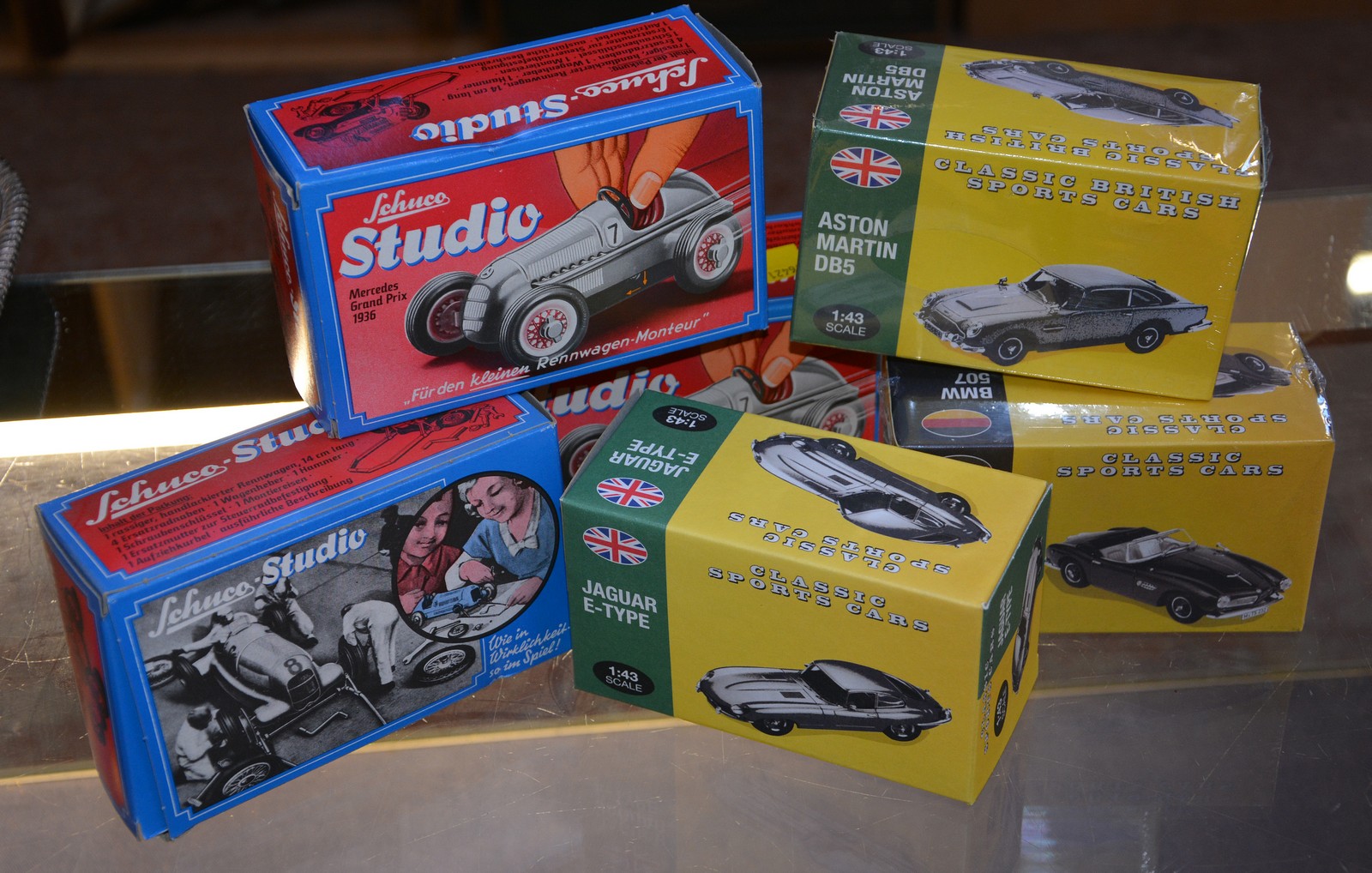 Three boxed Schuco Studio Mercedes Gran Prix 1936, and three boxed 01:43 Classic Sports Cars,