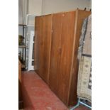 A Gordon Russell 1940's wardrobe 180cm high, 122cm wide, together with another similar 180cm high,