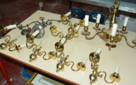A 20th Century brass five branch electrolier, a set of four matching twin branch wall lights, and