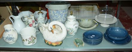 A quantity of decorative ceramics to include a ceramic and glass cheese cover, table lamps, jugs