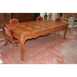 A French parquetry oak extending dining table 249cm length