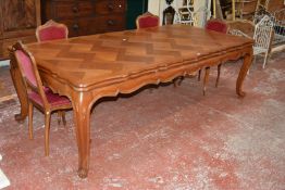 A French parquetry oak extending dining table 249cm length