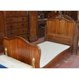 A walnut framed single bed in Louis XV style 146cm high, 207cm length