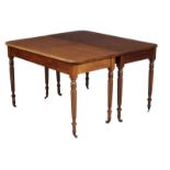 A Regency mahogany dining table, circa 1815, in the manner of Gillows of Lancaster, the